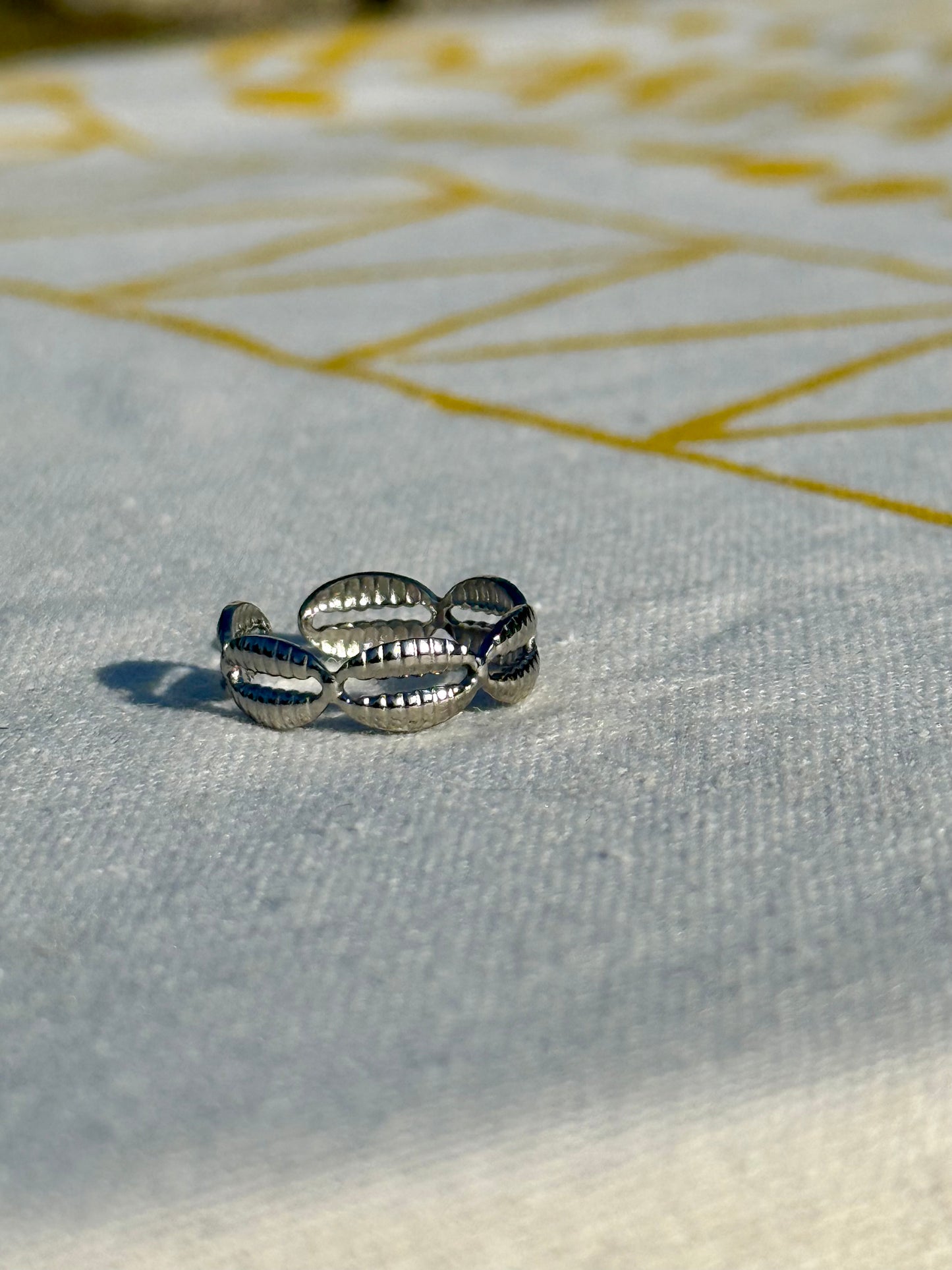 Forever Cowrie in Silver + Gold