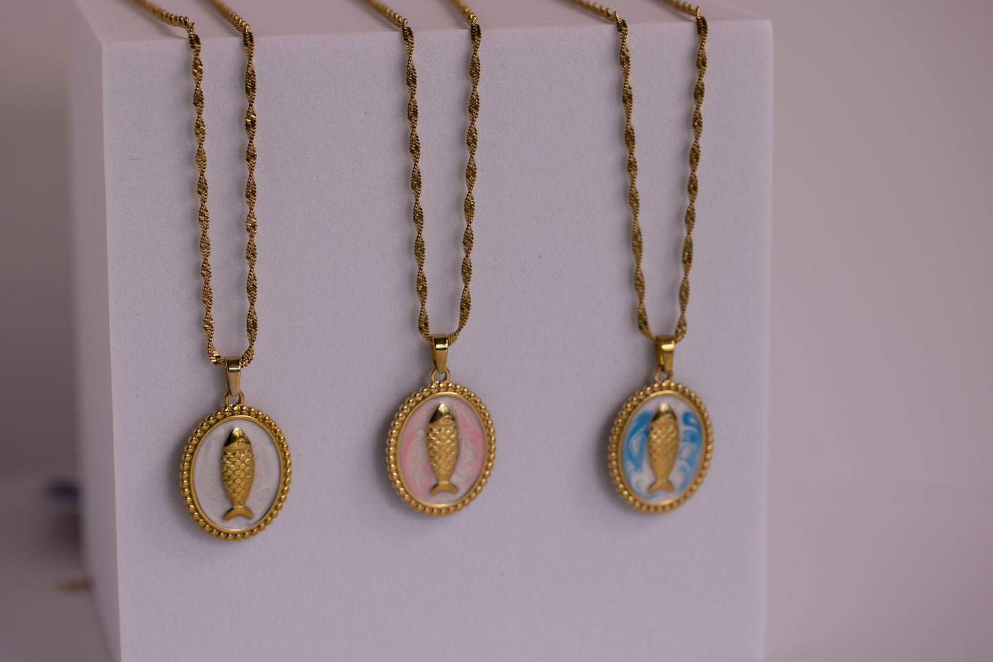 Fish Medallion Necklaces in Various Colors