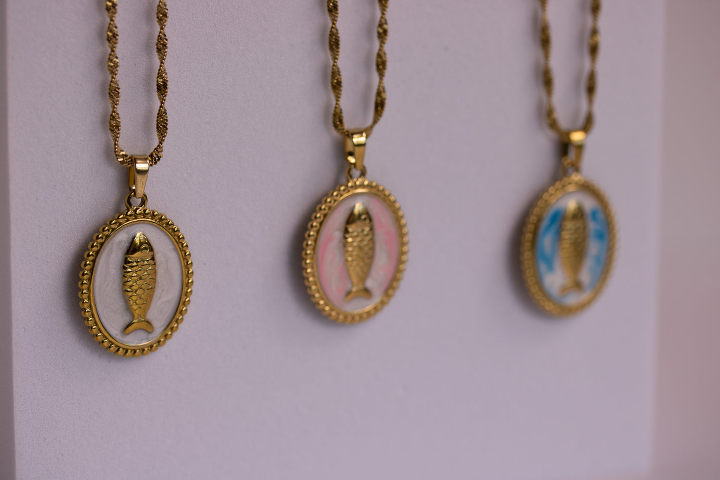 Fish Medallion Necklaces in Various Colors
