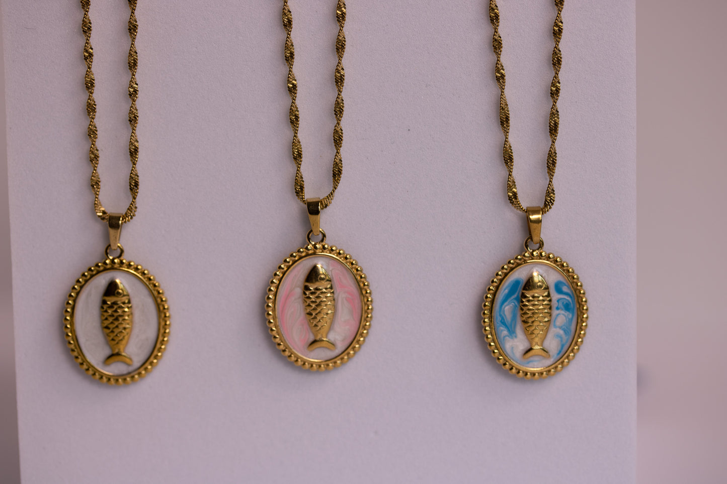 Fish Medallion Necklaces in Various Colors