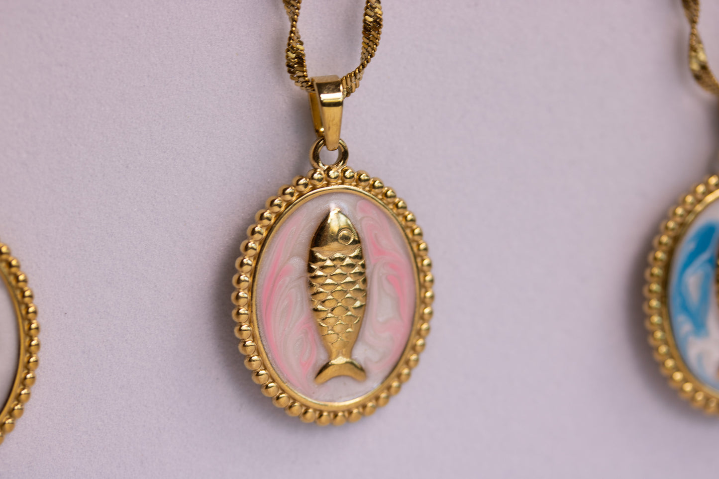 Fish Medallion Necklaces in Various Colors