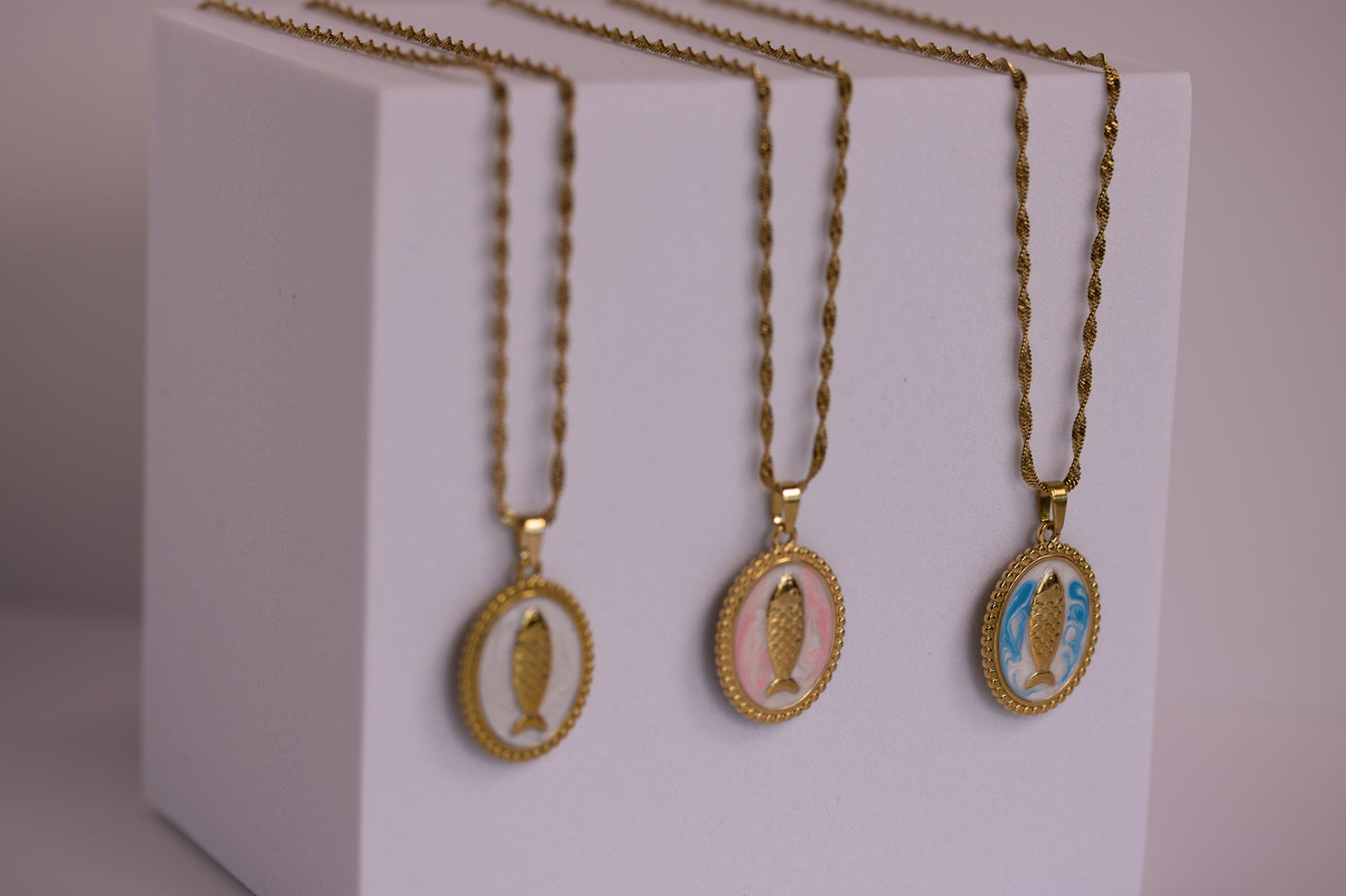 Fish Medallion Necklaces in Various Colors